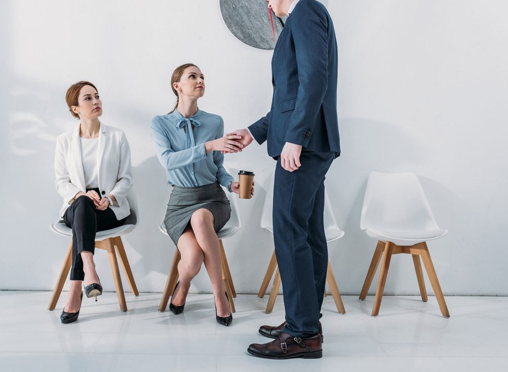 cropped-view-of-recruiter-shaking-hands-with-emplo-2022-12-10-01-23-34-utc.jpg